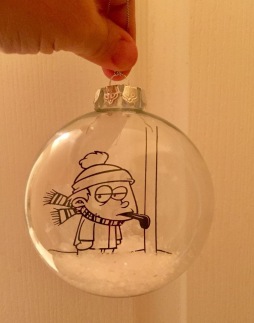 vinyl design from the movie a Christmas Story, fake snow in the bottom of the ornament